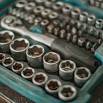 Maintenance Tools - silver and black round coins