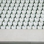 Multiple Properties - white seats with gray concrete platform