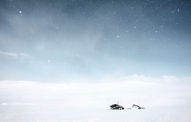 Globe House - snow covered house