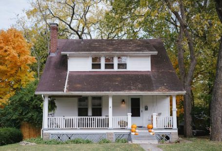 Home Inspection - trees beside white house