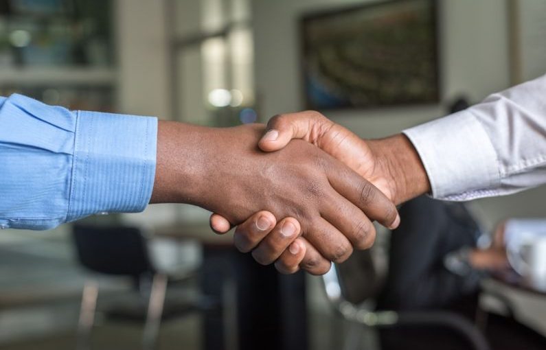 Handshake Agreement - two people shaking hands