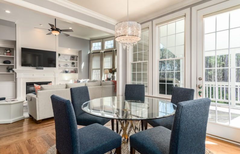 Home Appraisal - round clear glass-top table and five gray chairs dining se