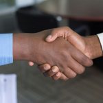 Handshake Deal - two person handshaking