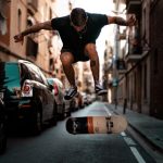 House Flip - timelapse photography of man riding skateboard