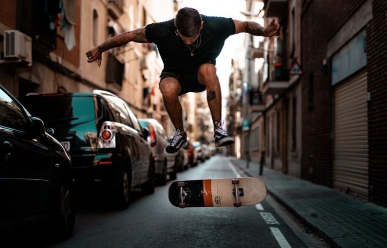 House Flip - timelapse photography of man riding skateboard