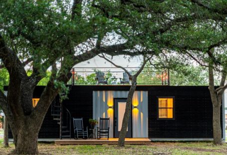Tiny Home - brown wooden house near green tree during daytime
