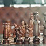 Risk Management - selective focus photography of chess pieces