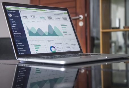 Data Analytics - laptop computer on glass-top table