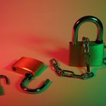 Cybersecurity Lock - pink padlock on silver chain